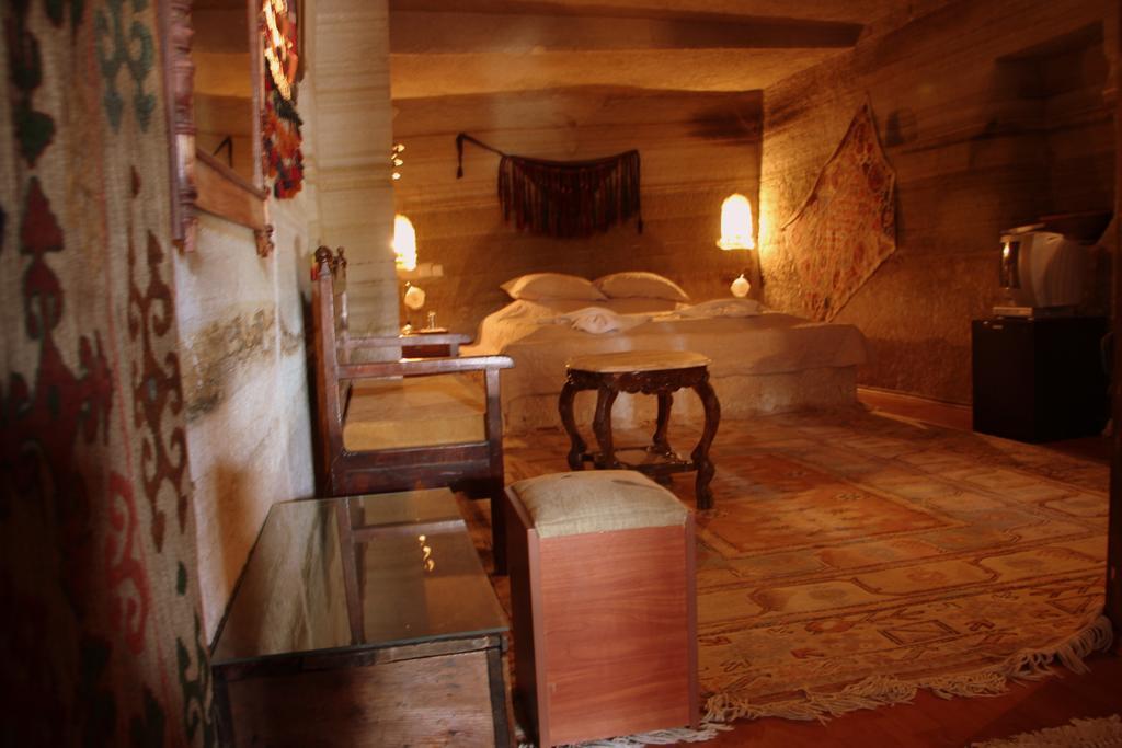 Oriental Cave Suites Гьореме Стая снимка